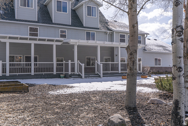 1045 Fox Farm Road Logan, UT 84321 - Photo 59 of 65 Snow covered property with roof with shingles