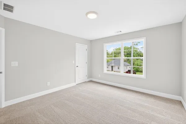 a bathroom with a sink toilet a bathtub and vanity