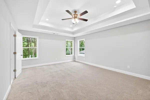 a bathroom with a bathtub and shower