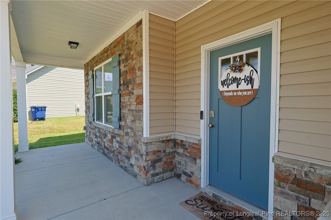 213 Sand Rock Road Fayetteville, NC 28306 - Photo 2 of 27 a view of front door of house and front door