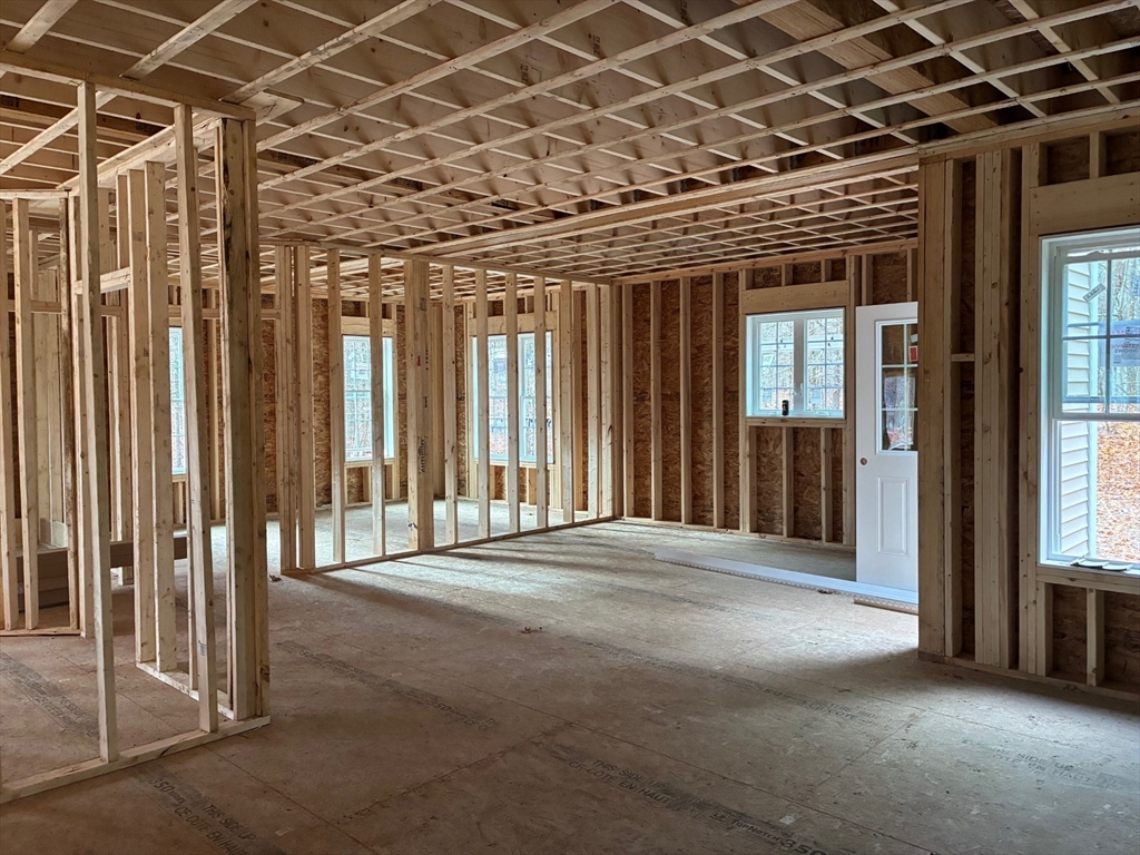 4 Jewett Road, Unit B Sterling, MA 01564 - Photo 4 of 9 a view of a room with wooden walls