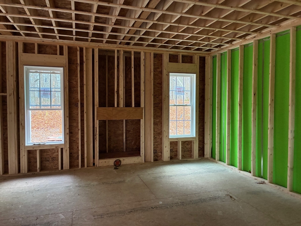 4 Jewett Road, Unit B Sterling, MA 01564 - Photo 5 of 9 a view of a porch with wooden floor and a window
