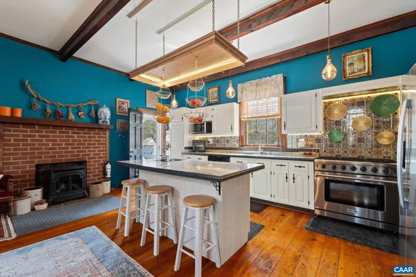 a view of a storage & utility room with sink