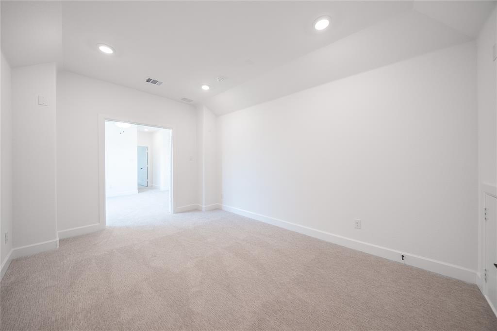 2719 Triumph Court Heath, TX 75126 - Photo 23 of 39 a view of an empty room