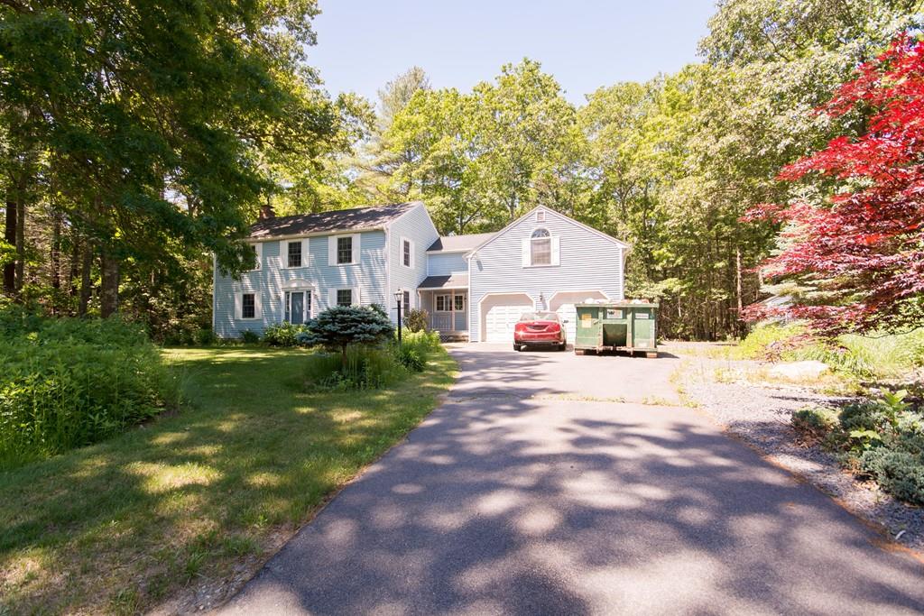 1 Bells Brook Road Lakeville, MA 02347 - Photo 21 of 21 a view of a white house next to a yard with big trees