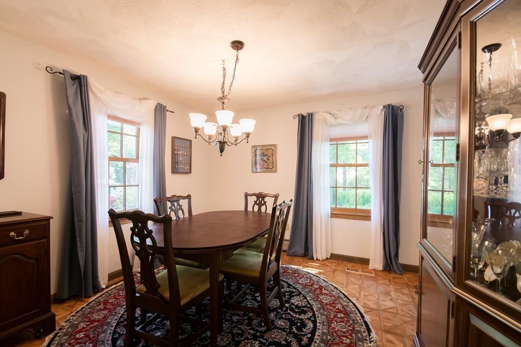 1 Bells Brook Road Lakeville, MA 02347 - Photo 5 of 21 a view of a dining room with furniture window and outside view