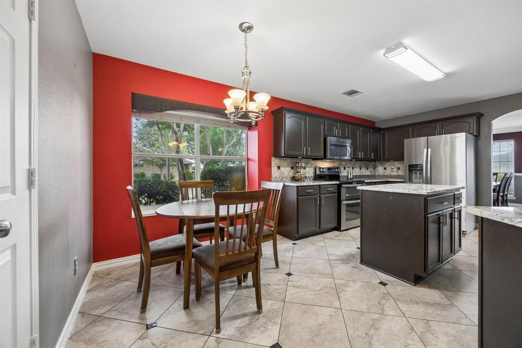 545 Rothschild Lane Murphy, TX 75094 - Photo 9 of 27 Breakfast nook with large window enjoying outside views.