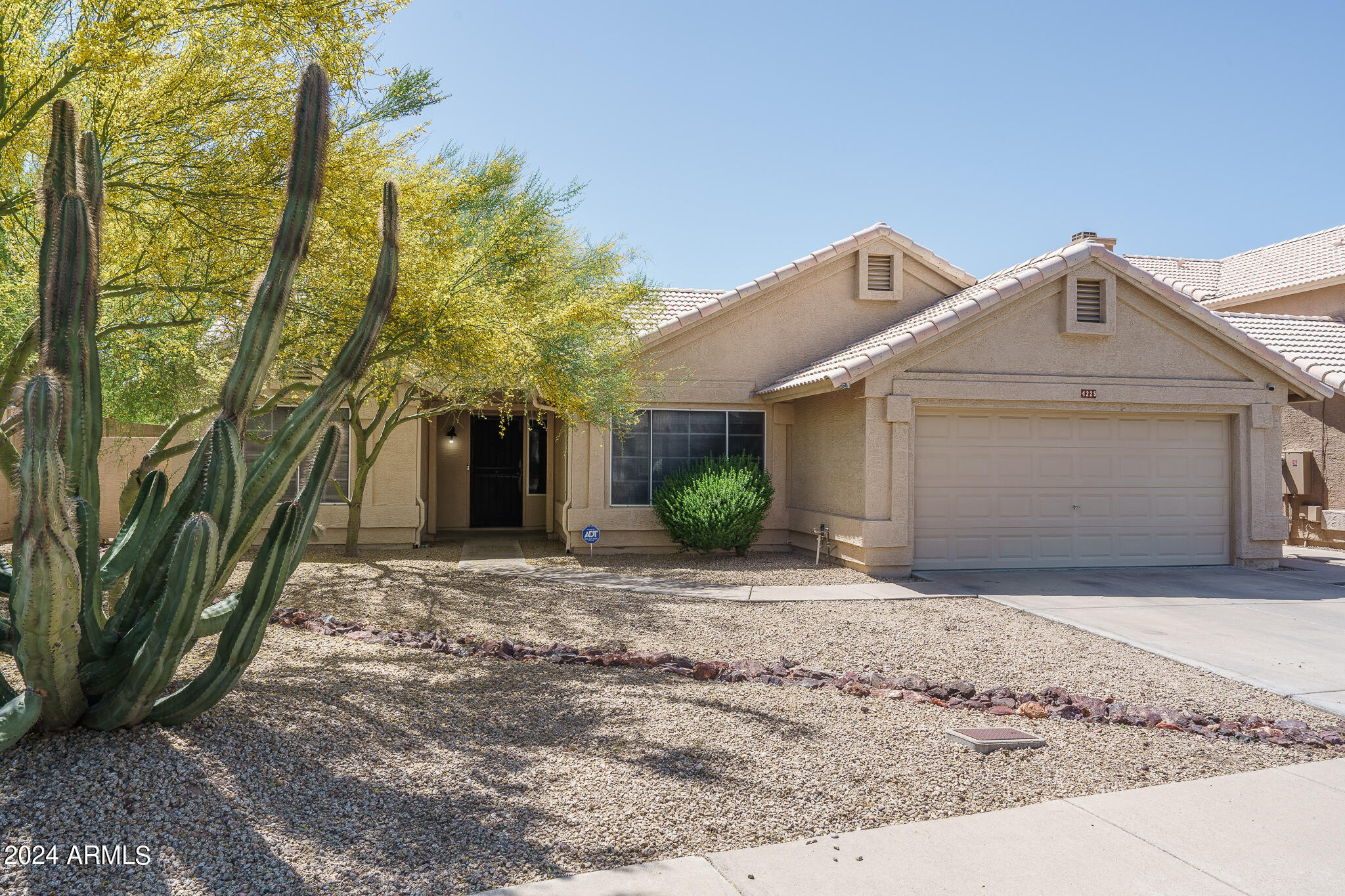 4225 East Montgomery Road Cave Creek, AZ 85331 - Photo 1 of 1 a front view of a house with a yard and garage