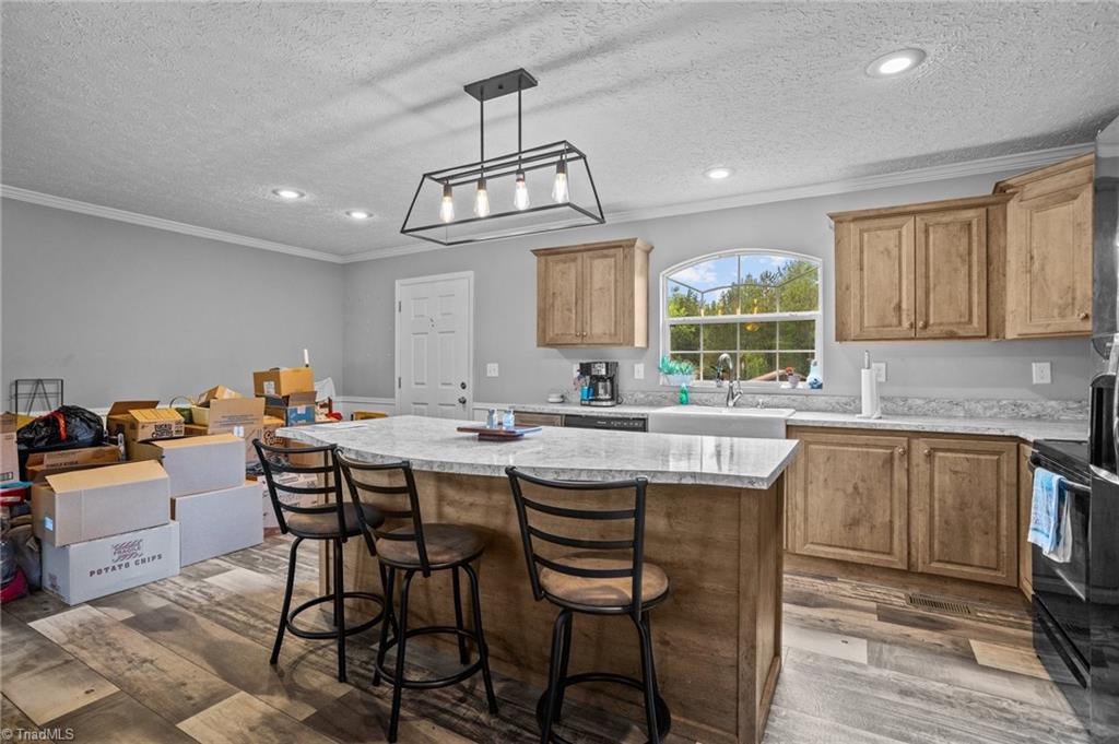 1792 Hill Road Lexington, NC 27292 - Photo 14 of 48 Kitchen with dining area and kitchen island.