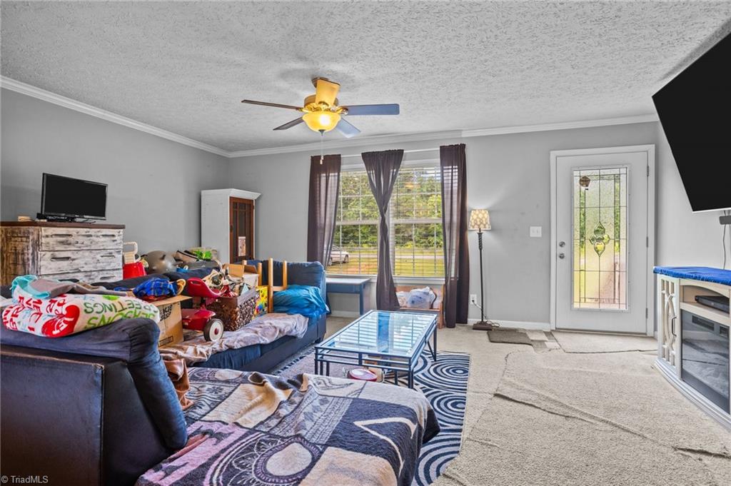 1792 Hill Road Lexington, NC 27292 - Photo 3 of 48 Living room with ceiling fan.