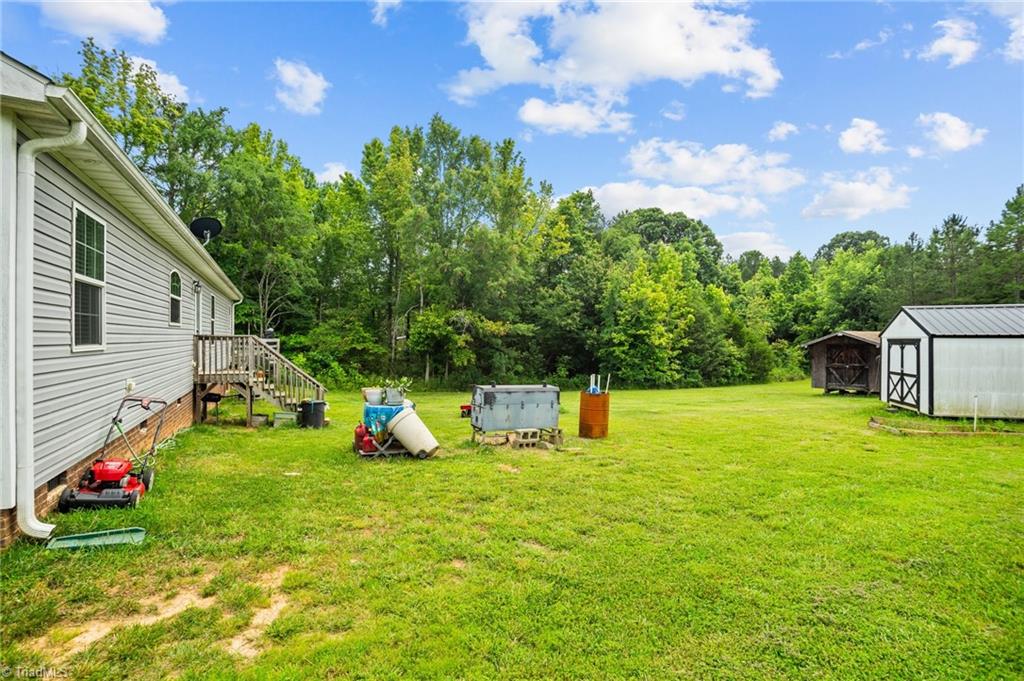 1792 Hill Road Lexington, NC 27292 - Photo 39 of 48 Huge backyard with a couple of storage shed.