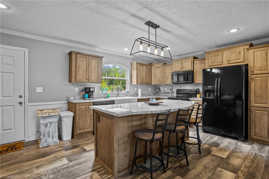 1792 Hill Road Lexington, NC 27292 - Photo 6 of 48 Kitchen with lots of cabinet spaces and large island.