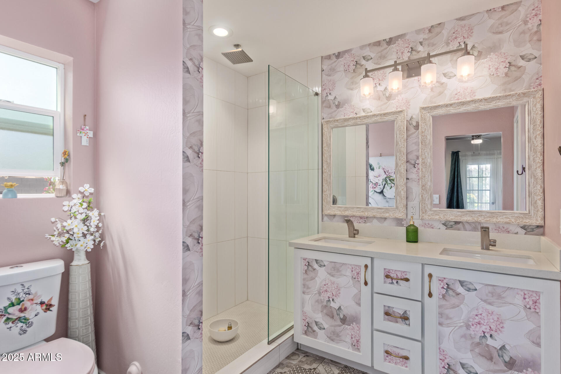 313 West Utopia Road Phoenix, AZ 85027 - Photo 13 of 59 a bathroom with double vanity sink and a mirror
