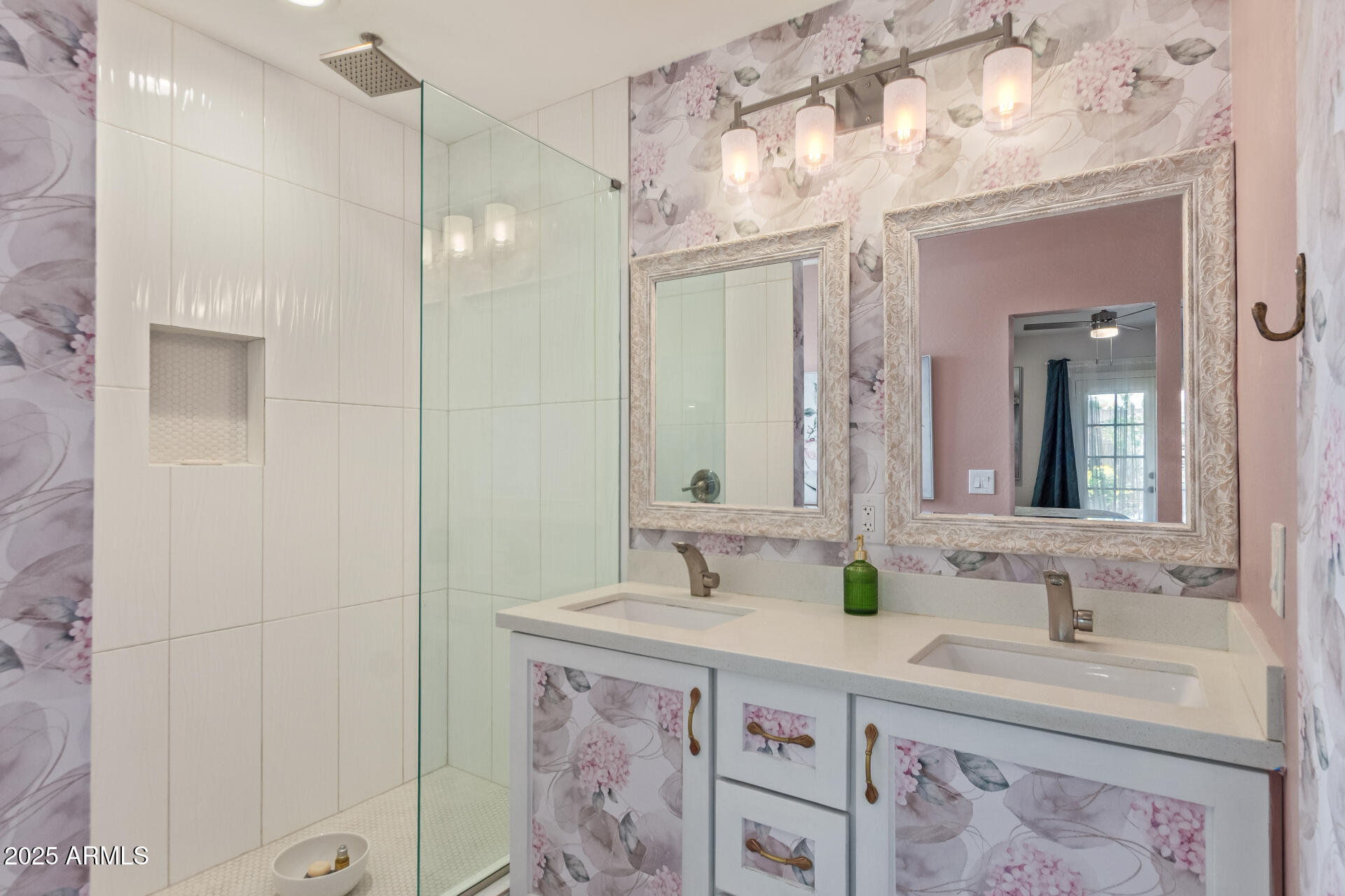 313 West Utopia Road Phoenix, AZ 85027 - Photo 14 of 59 a bathroom with double vanity sink and a mirror