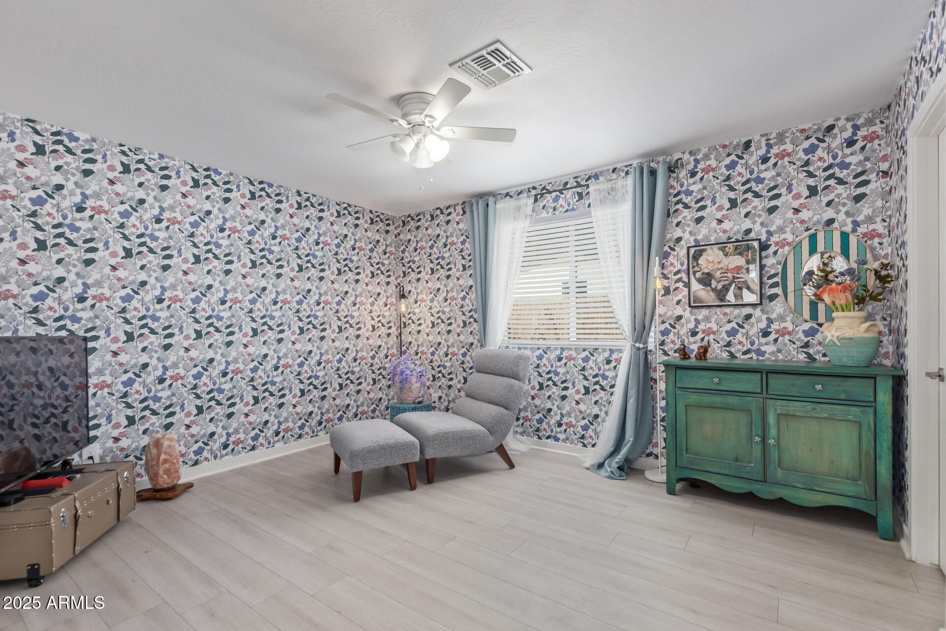 313 West Utopia Road Phoenix, AZ 85027 - Photo 16 of 59 a living room with furniture and a fireplace