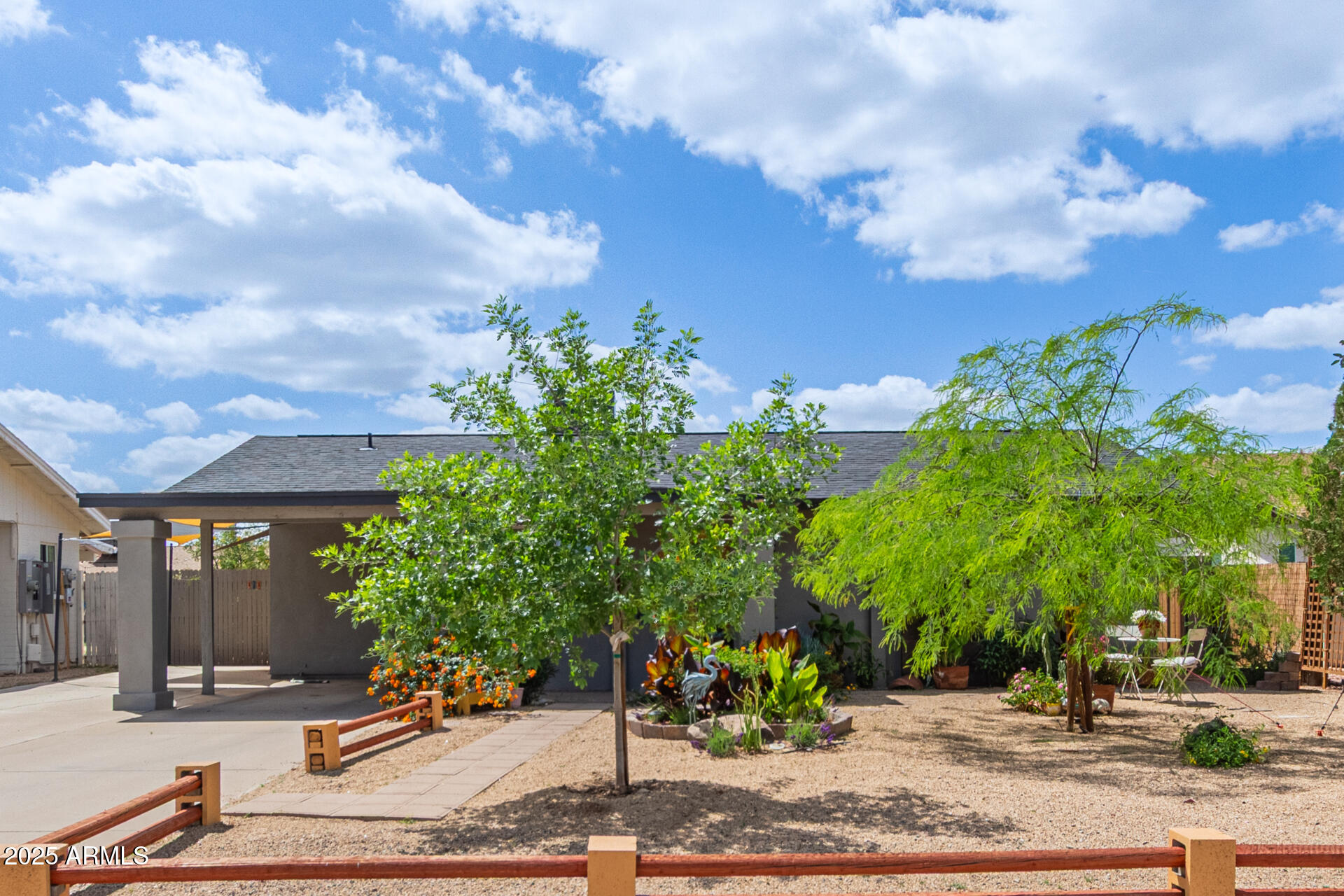 313 West Utopia Road Phoenix, AZ 85027 - Photo 2 of 59 a view of a street with a house