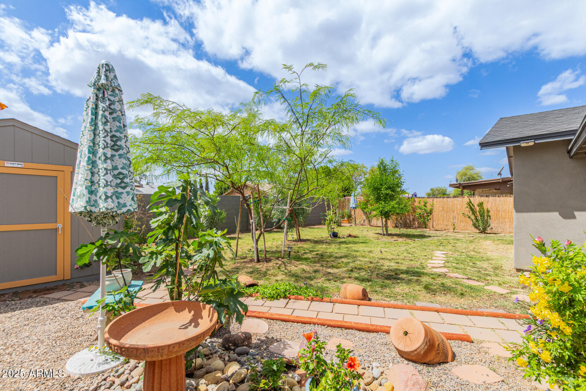 313 West Utopia Road Phoenix, AZ 85027 - Photo 23 of 59 a view of a backyard