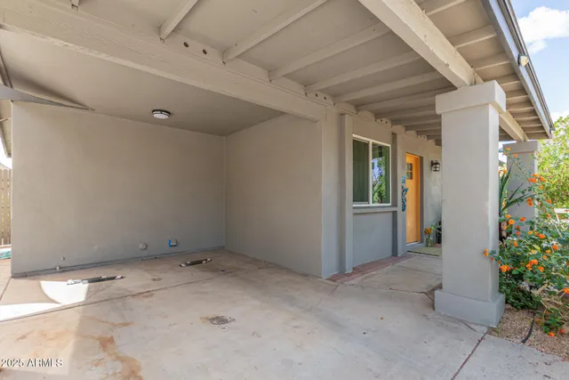a view of swimming pool with patio