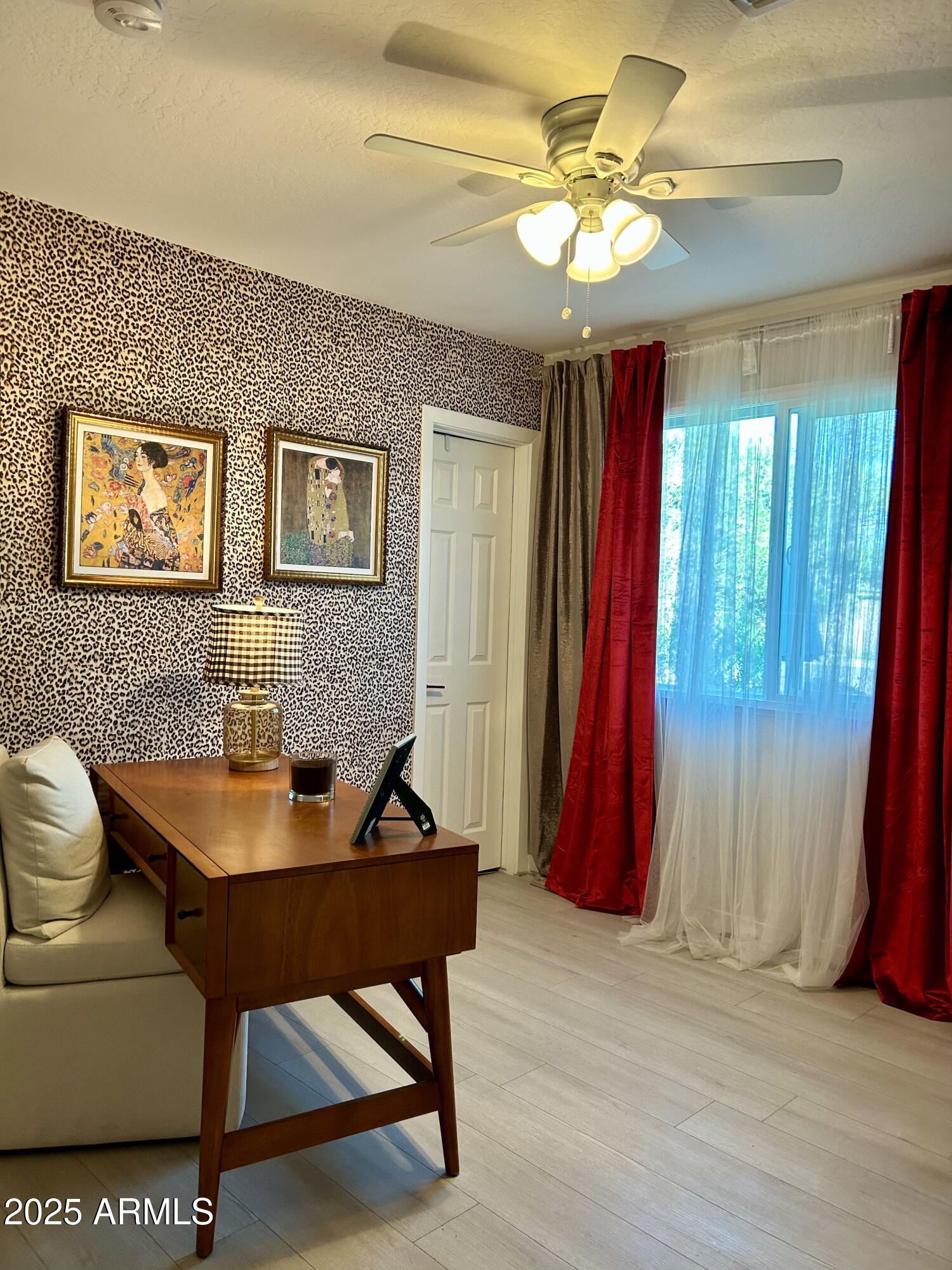 313 West Utopia Road Phoenix, AZ 85027 - Photo 40 of 59 a dining room with a table and a chandelier