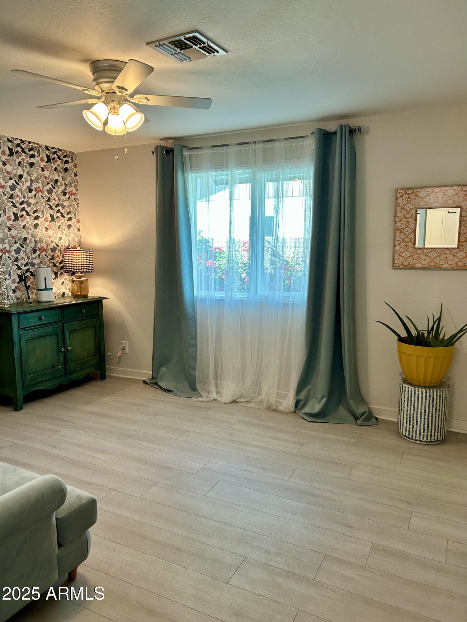 313 West Utopia Road Phoenix, AZ 85027 - Photo 42 of 59 a view of an empty room with a window