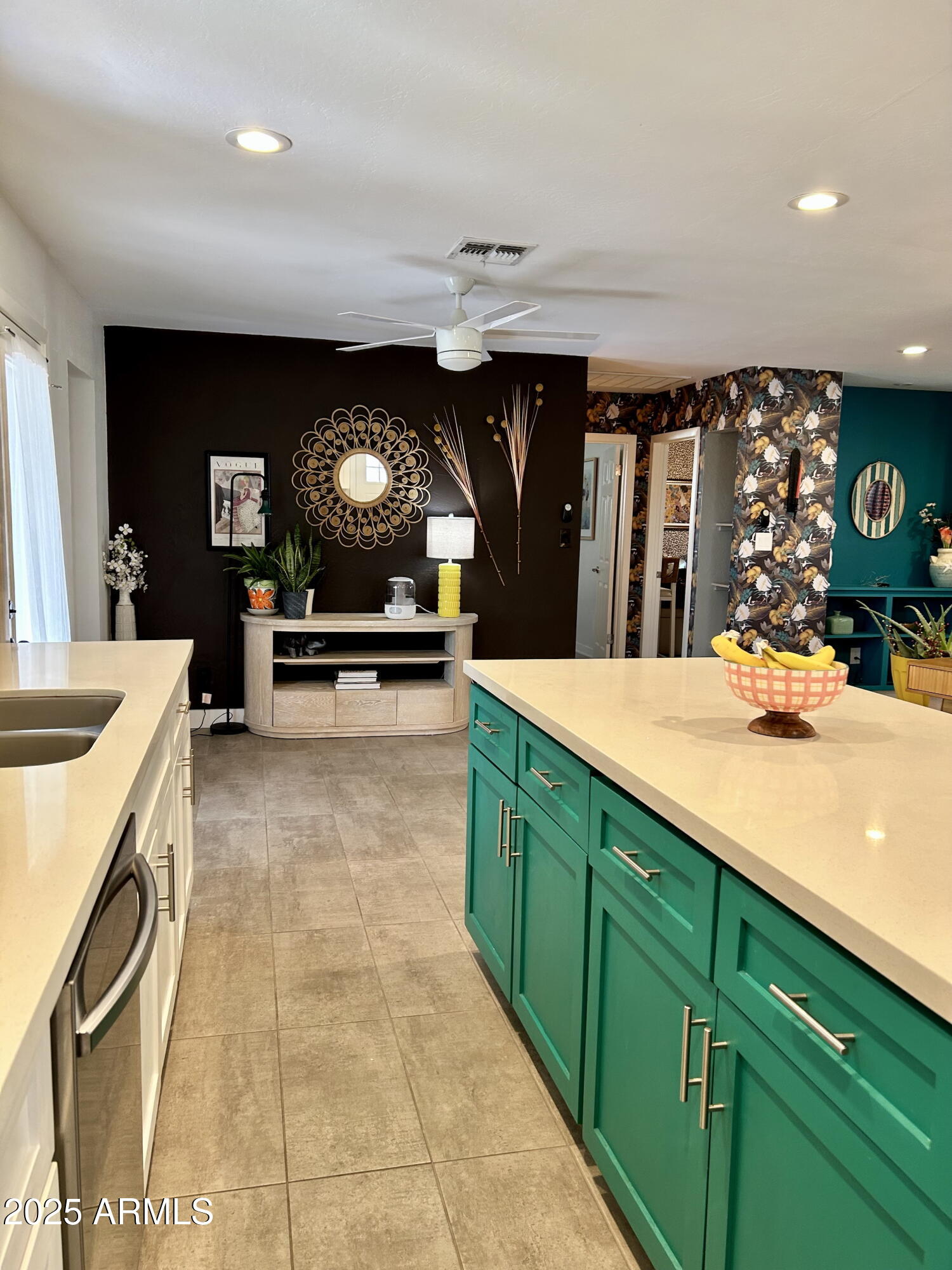 313 West Utopia Road Phoenix, AZ 85027 - Photo 48 of 59 a kitchen with stainless steel appliances granite countertop a sink and a stove