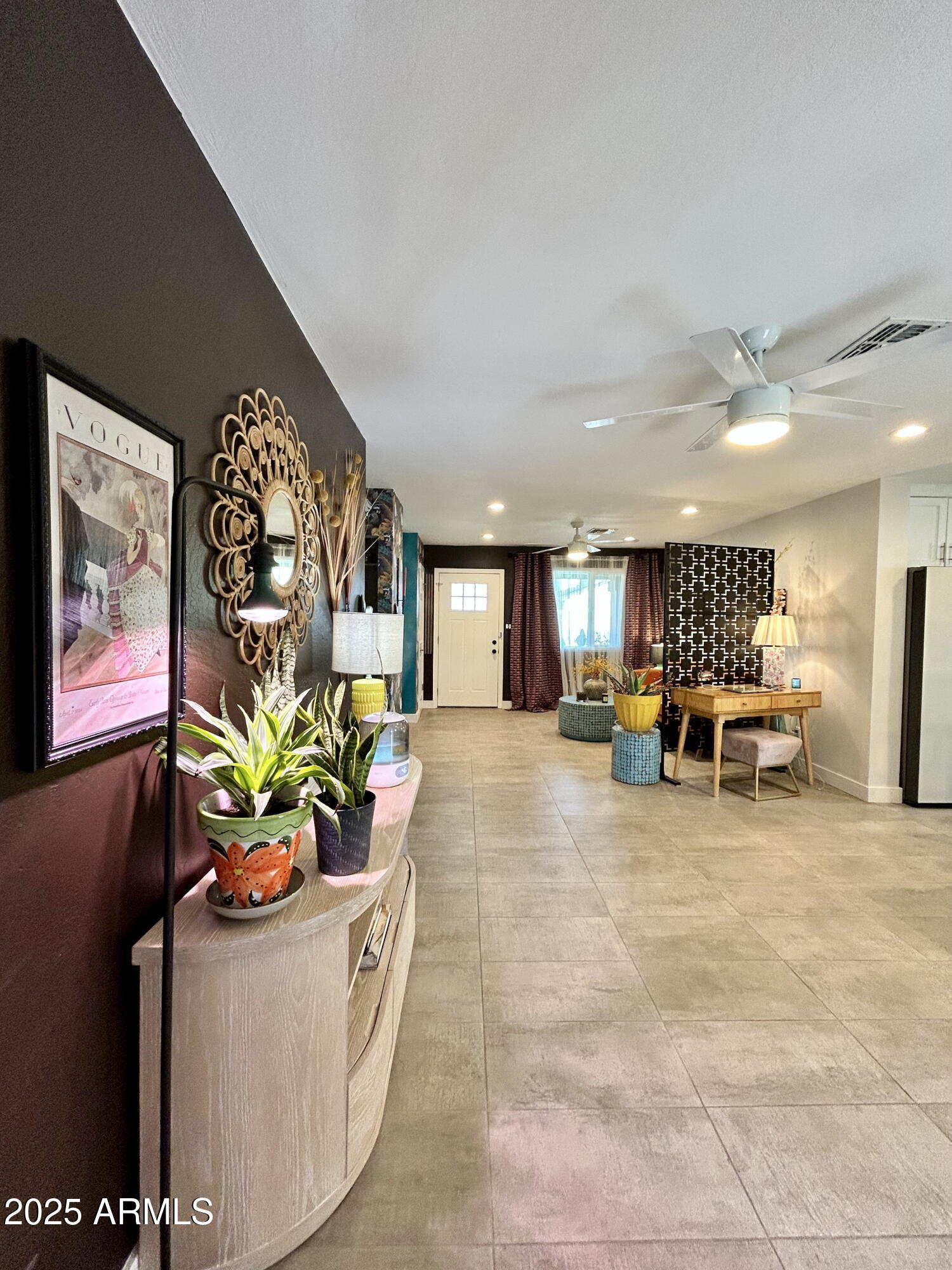 313 West Utopia Road Phoenix, AZ 85027 - Photo 53 of 59 a living room with furniture and potted plant