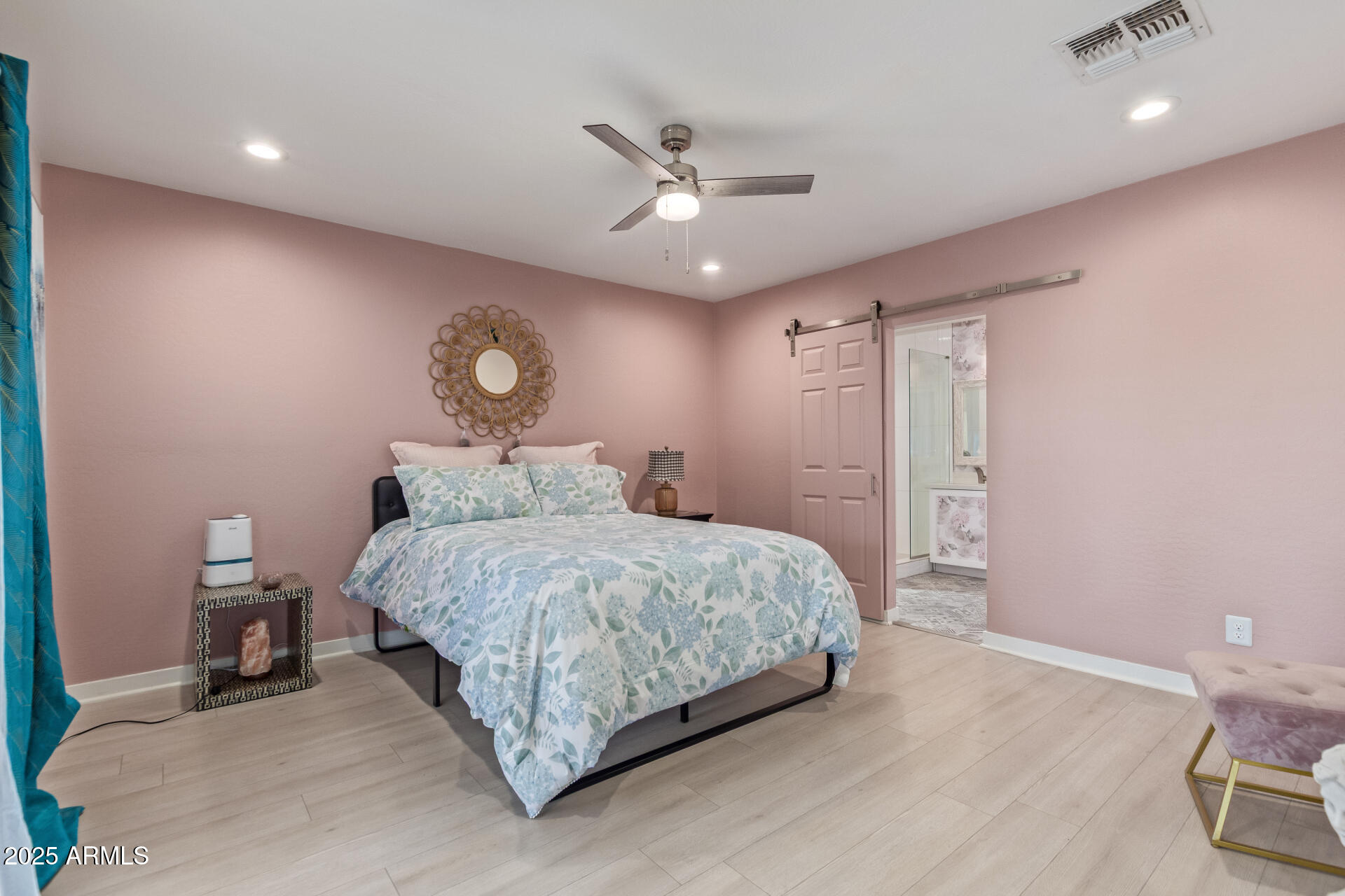 313 West Utopia Road Phoenix, AZ 85027 - Photo 10 of 59 a bedroom with a bed and a ceiling fan