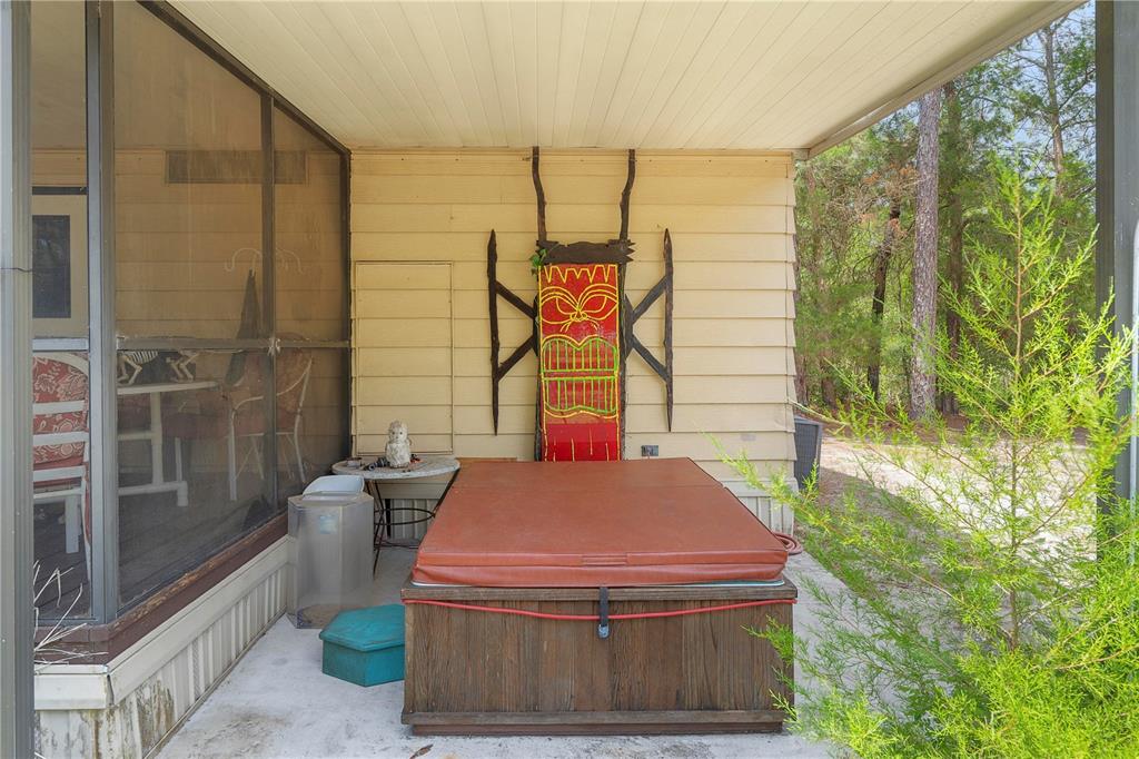 7373 Fall Street Brooksville, FL 34613 - Photo 19 of 26 a room with pool table and windows