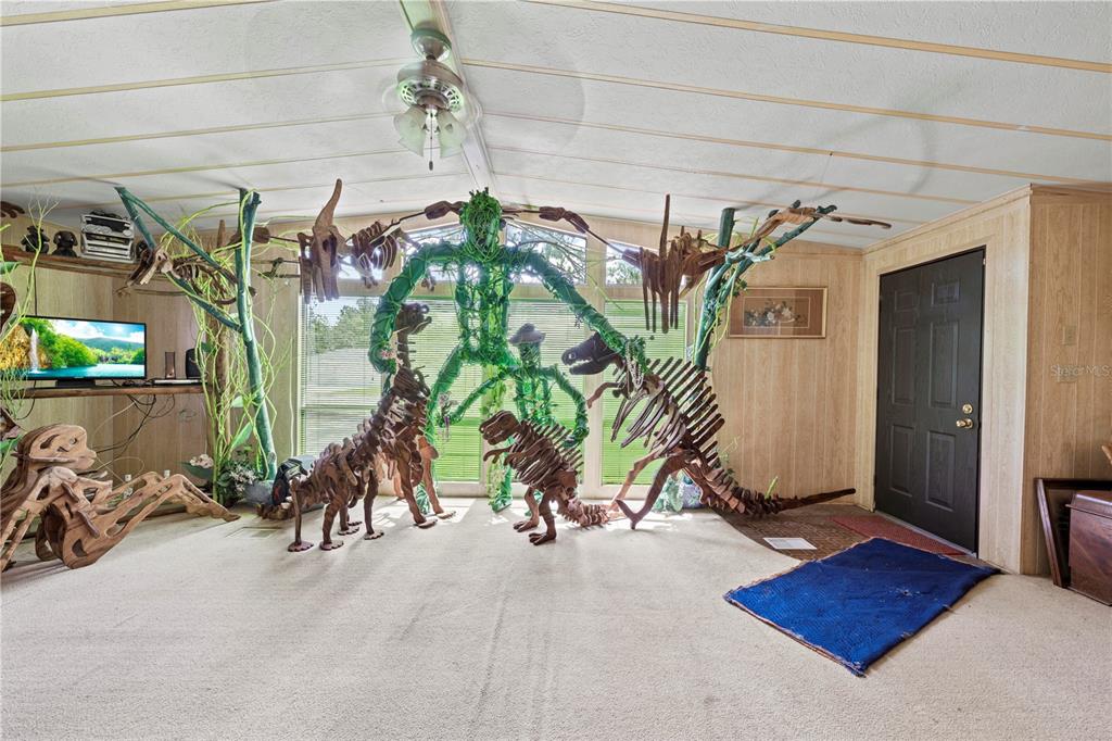 7373 Fall Street Brooksville, FL 34613 - Photo 7 of 26 a view of a room with gym equipment