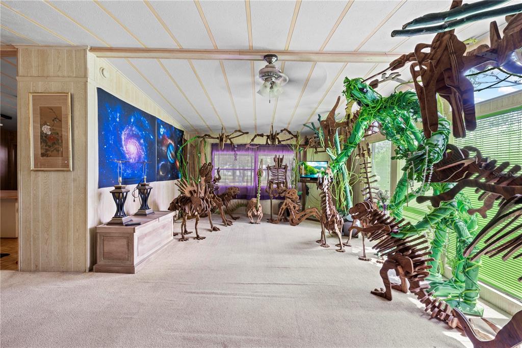 7373 Fall Street Brooksville, FL 34613 - Photo 8 of 26 a view of a chairs and table in a patio