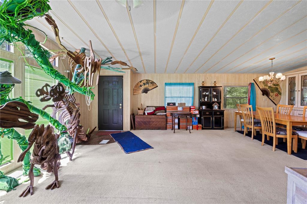 7373 Fall Street Brooksville, FL 34613 - Photo 9 of 26 a view of a garage with furniture