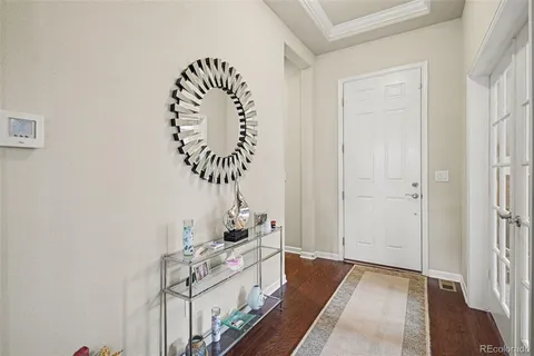 a view of entryway with wooden floor