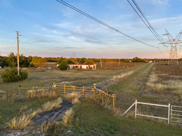 a kitchen with kitchen island a counter top space stainless steel appliances and cabinets
