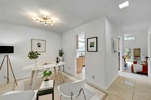 a kitchen with stainless steel appliances granite countertop a stove and a microwave