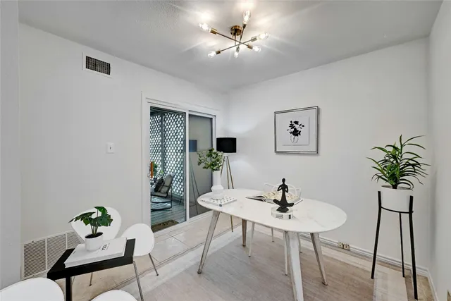 a view of a dining room with furniture