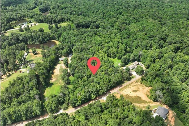 0 Marshall Store Road Watkinsville, GA 30677 - Photo 4 of 9 a backyard of a house with a yard and outdoor seating