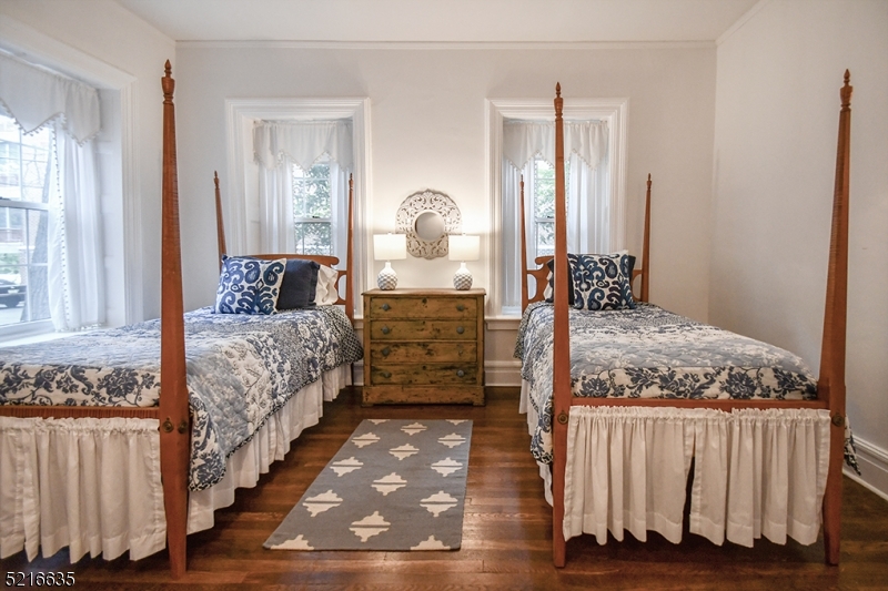 15 Euclid Avenue, Unit 3 Summit, NJ 07901 - Photo 2 of 10 a bed room with a bed and a window