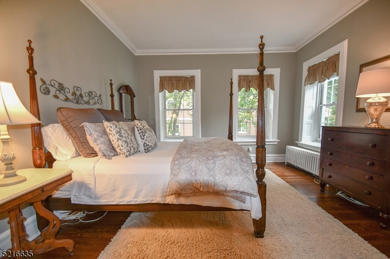 15 Euclid Avenue, Unit 3 Summit, NJ 07901 - Photo 7 of 10 a bedroom with a bed and window