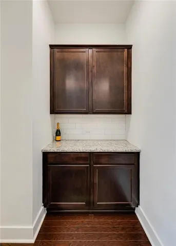 a view of a sink and cabinets
