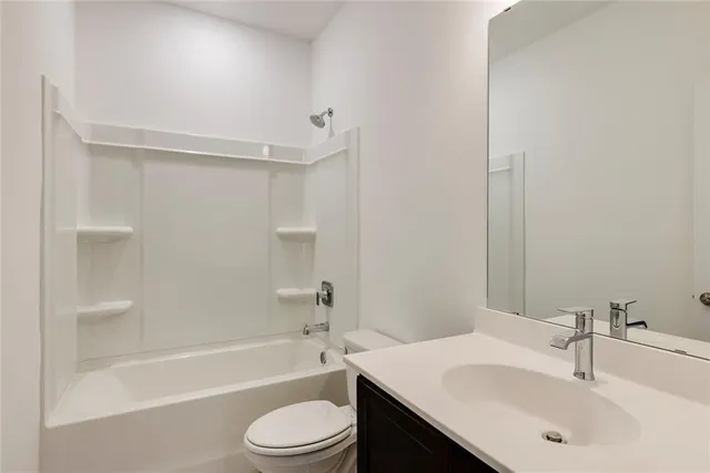 a bathroom with a sink toilet and a bathtub