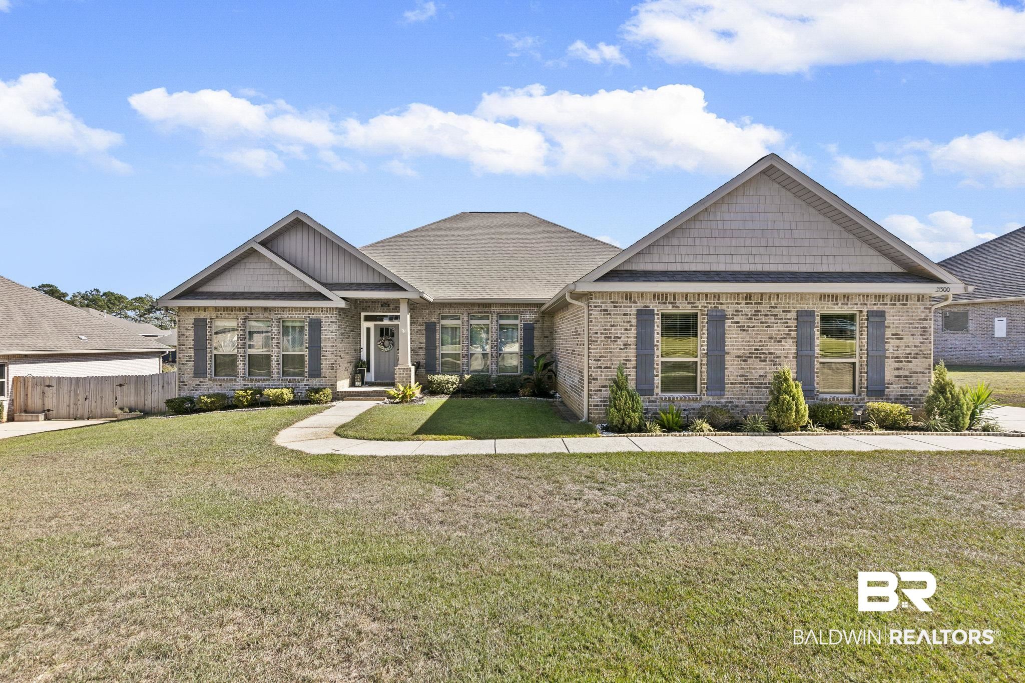 31500 Spoonbill Road Daphne, AL 36527 - Photo 1 of 85 Craftsman-style house featuring a front lawn