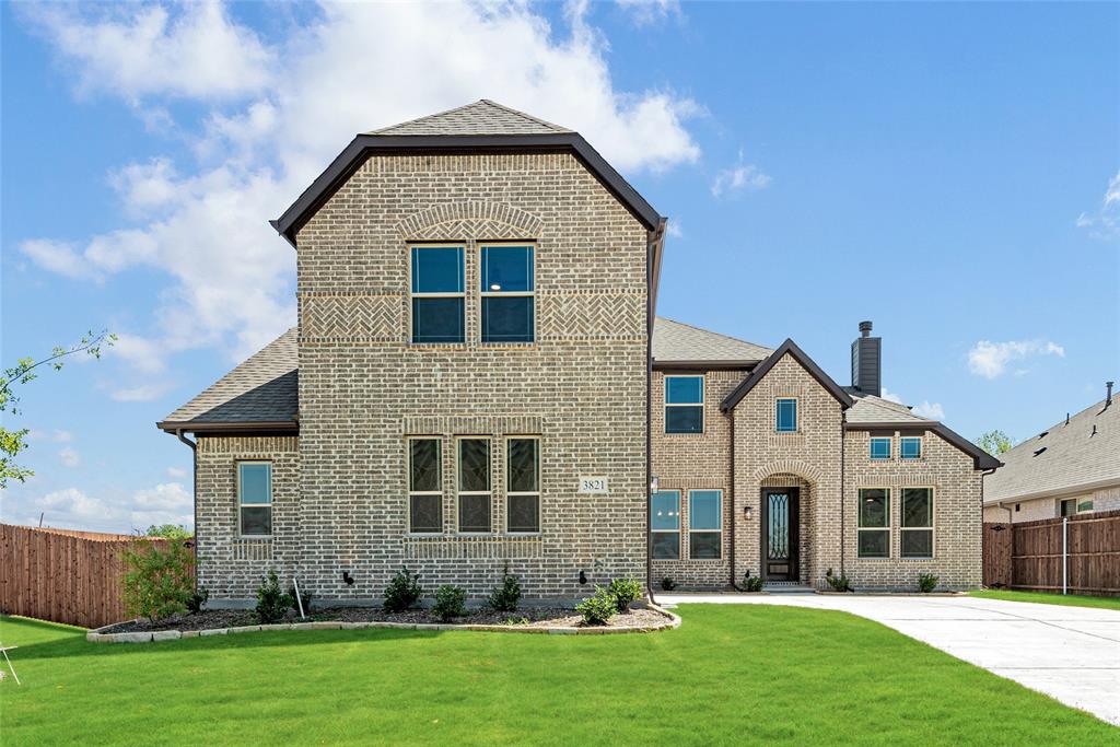 3821 Iron Gate Place Mesquite, TX 75181 - Photo 1 of 1 a front view of a house with a yard