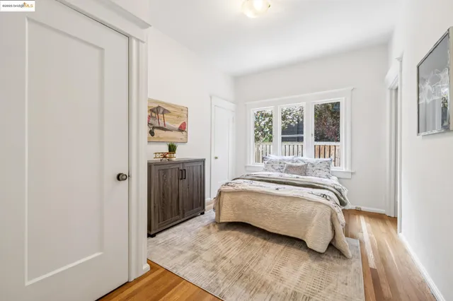 a room with a bed and a window