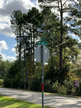 a view of a swimming pool and trees