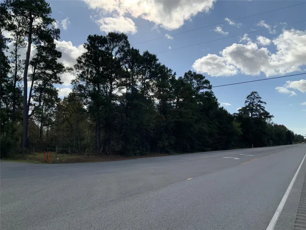 a view of balcony with trees