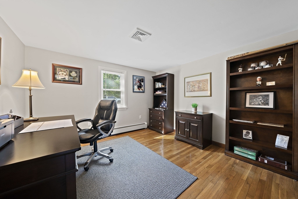 45 Pond Circle Mashpee, MA 02649 - Photo 11 of 26 a view of a workspace with furniture and cabinet