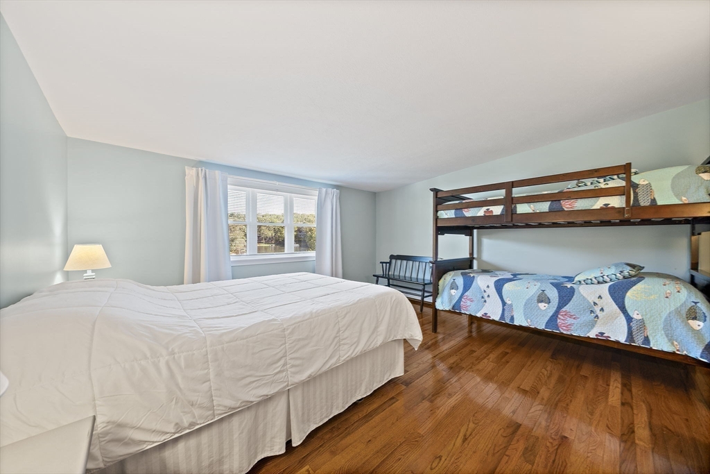 45 Pond Circle Mashpee, MA 02649 - Photo 17 of 26 a bedroom with two beds and window