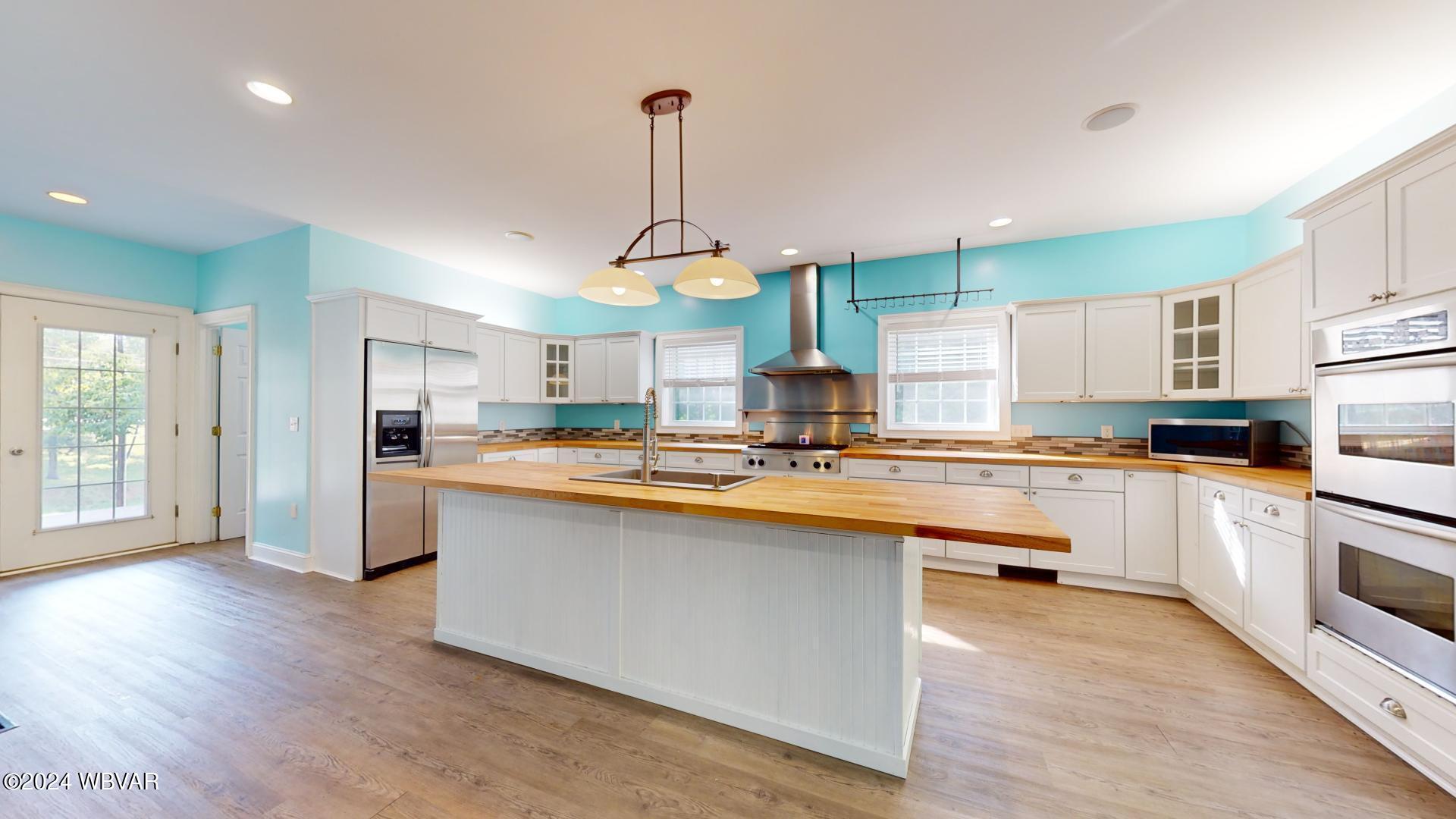 1885 Ravine Road Williamsport, PA 17701 - Photo 12 of 41 Chef's dream kitchen with large island, 6 burner stove & double wall oven