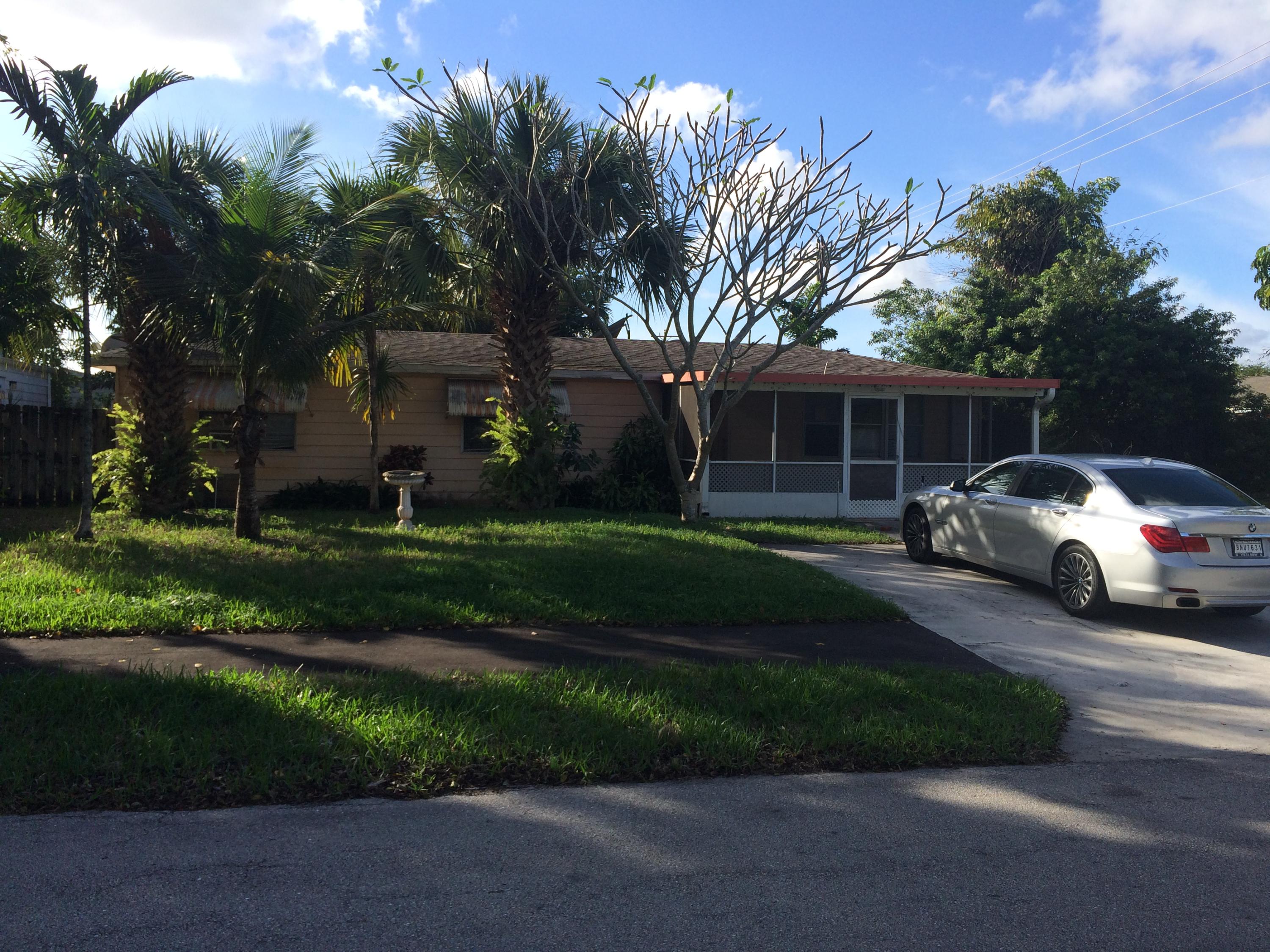 22825 Neptune Road Boca Raton, FL 33428 - Photo 1 of 1 NEPTUNE FRONT IMG_4514
