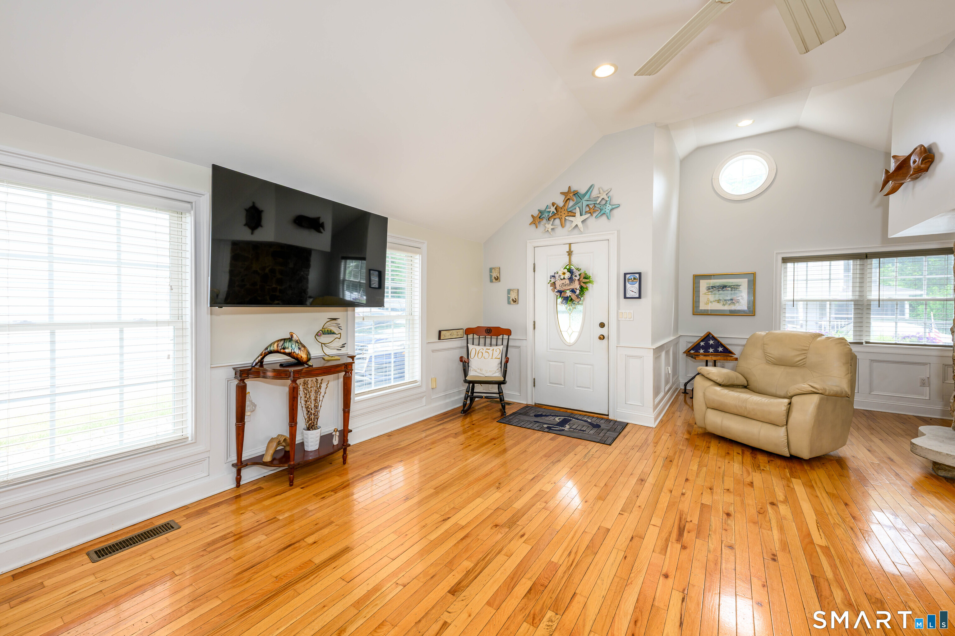 58 Minor Road East Haven, CT 06512 - Photo 10 of 40 Notice the raised paneling and molding around the windows.